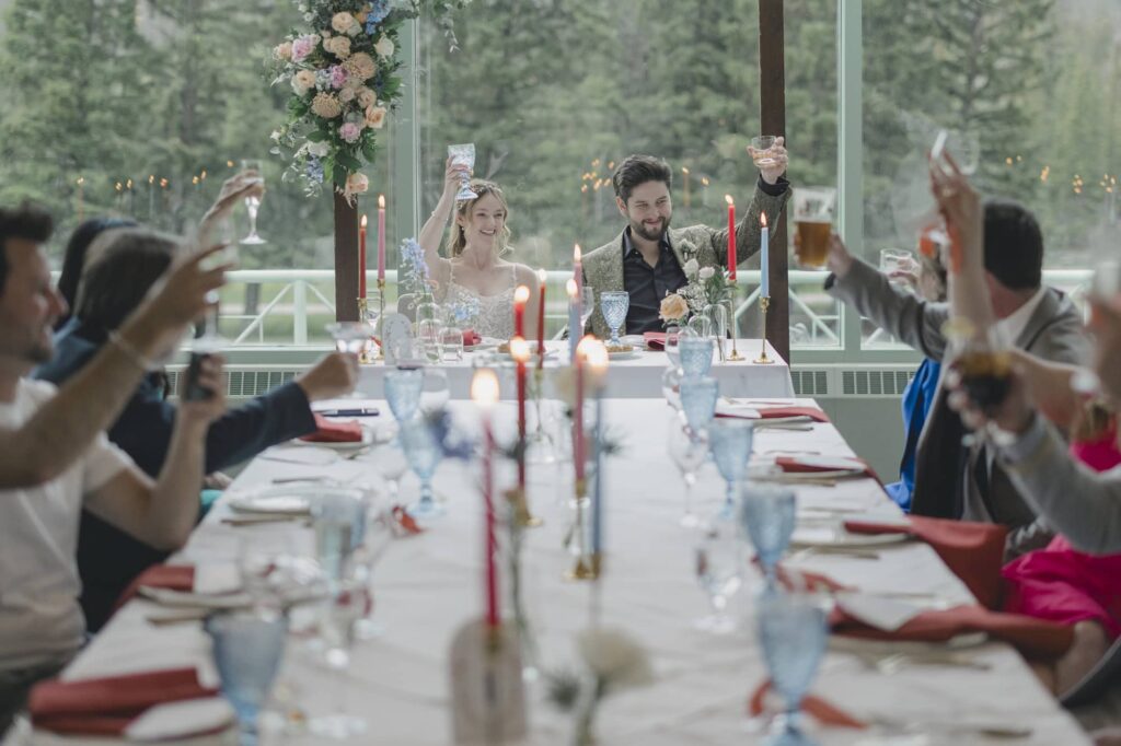 Wedding reception couple toast at Fairmont Banff