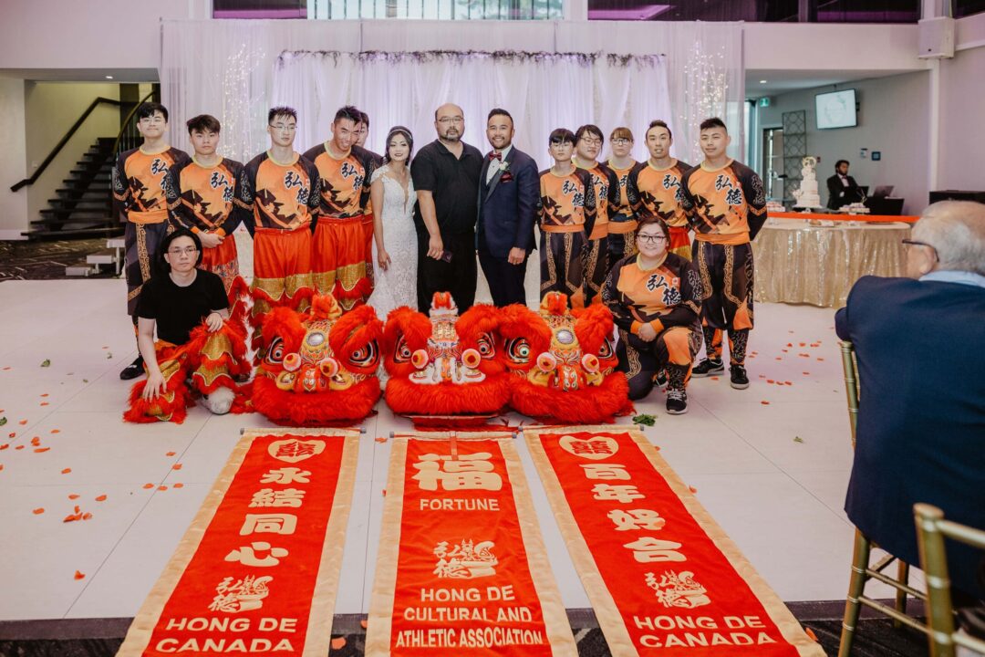 Lion dance crew with the newly weds at Grand Imperial Edmonton