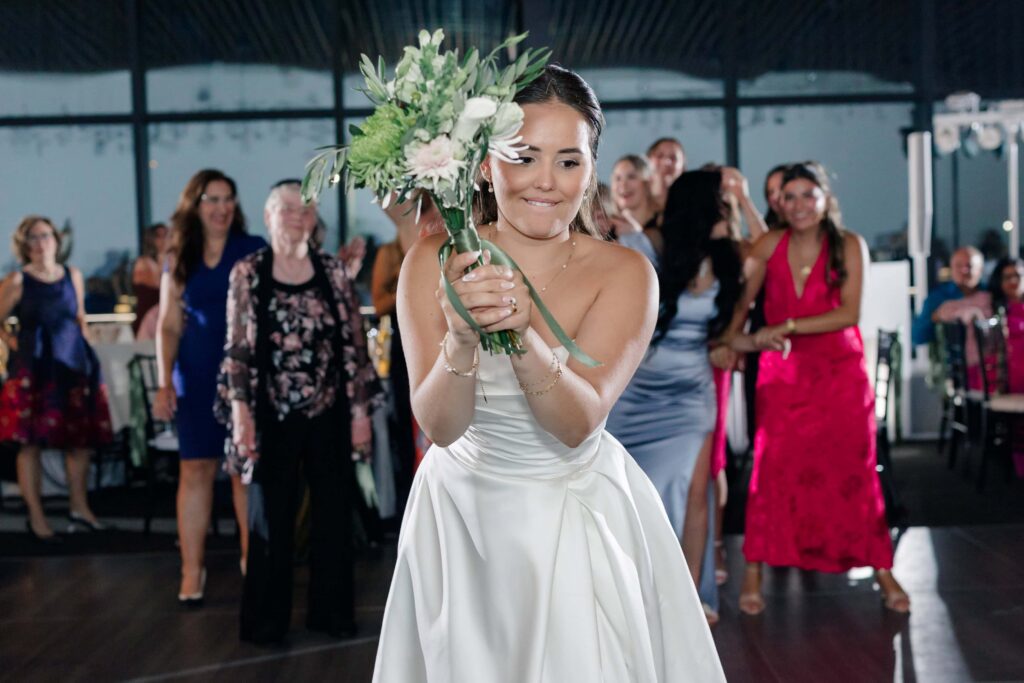 S & C -Bouquet Toss -  Royal Glenora Club wedding photos in Edmonton -Timeless Tales Creatives 