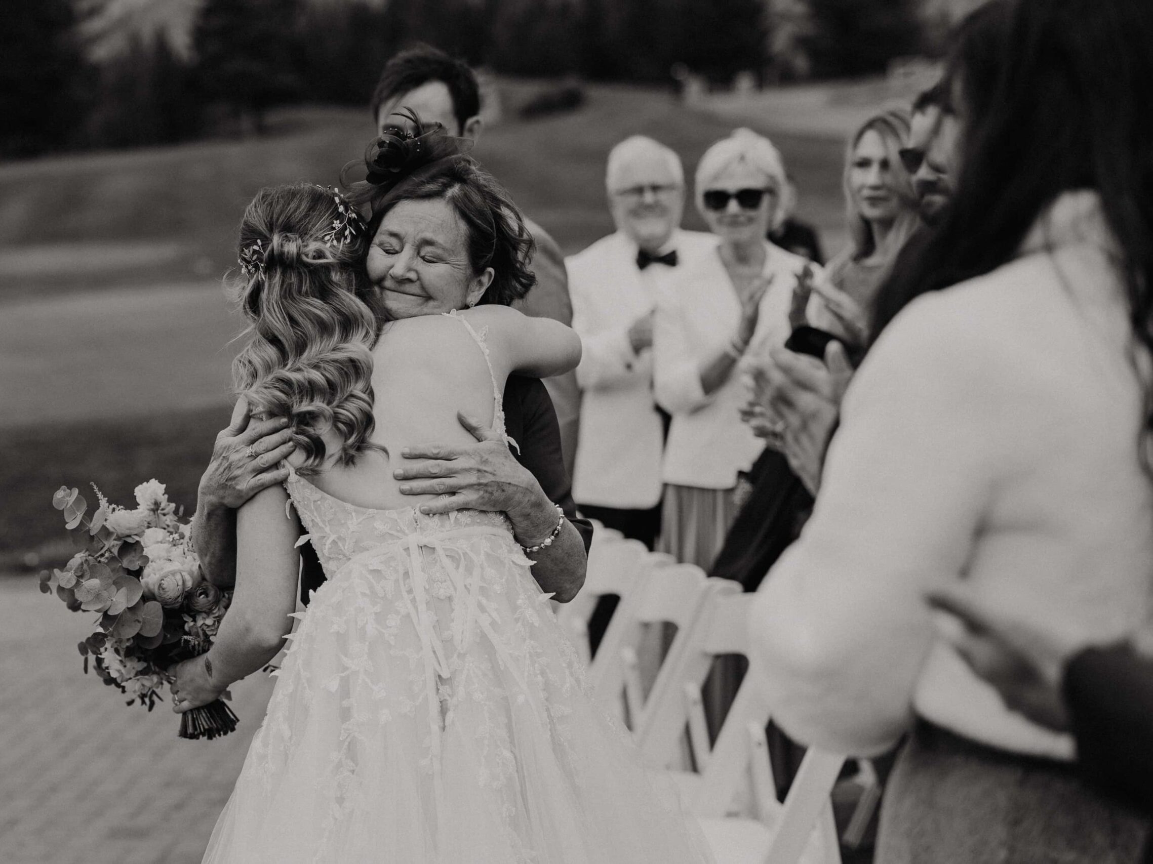 Documentary Wedding Photography | Real Moments, as it happened. Documentary Wedding Photography - Banff Wedding - Mom hugging the bride.